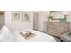 Well-lit bedroom featuring stylish decor, a comfortable bed, and a serene ambiance at 21 Locust Ter, Ocala, FL 34472