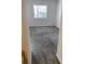 Cozy bedroom with a window, carpet flooring, and neutral paint at 2525 Caper Ln # 205, Maitland, FL 32751