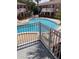 Elevated view of the community pool showcasing lounge chairs on the pool deck at 2525 Caper Ln # 205, Maitland, FL 32751