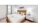 Bright bedroom features a king bed, stylish furnishings, and contemporary decor at 359 Famagusta Dr, Davenport, FL 33896