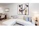 Comfortable living area with a sectional sofa, modern artwork, and open layout to the dining area at 359 Famagusta Dr, Davenport, FL 33896