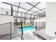Private screened-in pool and a patio with lounge chairs surrounded by an enclosed lanai at 359 Famagusta Dr, Davenport, FL 33896