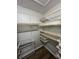 Walk-in closet with wire shelving at 5953 Westgate Dr # 1821, Orlando, FL 32835