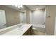 Bathroom featuring a bathtub, shower, and a large mirror over the vanity at 6221 Argent Wood Dr, Winter Garden, FL 34787