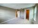 Bedroom with plush carpeting leading to bathroom and walk in closet at 6221 Argent Wood Dr, Winter Garden, FL 34787