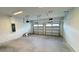 Spacious two-car garage with two garage door openers and ample space at 6221 Argent Wood Dr, Winter Garden, FL 34787