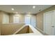 Second story hallway with neutral walls and trim at 6221 Argent Wood Dr, Winter Garden, FL 34787