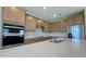 Open kitchen featuring stainless steel appliances and a large center island at 6221 Argent Wood Dr, Winter Garden, FL 34787