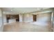 Spacious open-concept living room with tile flooring and recessed lighting at 6221 Argent Wood Dr, Winter Garden, FL 34787