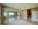 Spacious open-concept living room with tile flooring and recessed lighting at 6221 Argent Wood Dr, Winter Garden, FL 34787