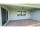 Covered patio featuring brick pavers, recessed lighting, and a view of the backyard at 6221 Argent Wood Dr, Winter Garden, FL 34787