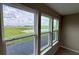Windows show a stunning water view, bringing the outdoors inside at 6221 Argent Wood Dr, Winter Garden, FL 34787