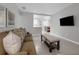 Comfortable living space with a view into the dining room and kitchen area at 654 Romano Ave, Orlando, FL 32807