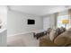 Open-concept living room with modern decor and plenty of room for relaxation and entertainment at 654 Romano Ave, Orlando, FL 32807