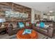 Spacious living room with a wood-paneled accent wall, creates a cozy gathering space at 962 Park Terrace Cir, Kissimmee, FL 34746