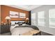 Comfortable bedroom with warm lighting, cozy bedding, and stylish bedside accents at 1023 Ladyfish Trl, St Cloud, FL 34771