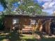 View of the rear of the property with two windows at 1807 N Powers Dr, Orlando, FL 32818