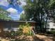 View of the rear of the property with two windows at 1807 N Powers Dr, Orlando, FL 32818