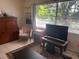 The living room features a large window and a television at 1807 N Powers Dr, Orlando, FL 32818