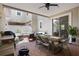 Open-air patio featuring a dining set, grill, and lounge area, ideal for entertaining at 1859 Island Village Way, Kissimmee, FL 34747