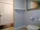 Comfortable bathroom with a toilet and closet with plenty of storage space for toiletries and linens at 1935 Conway Rd # M1, Orlando, FL 32812