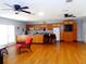 Large kitchen with wooden cabinets, a central island, and modern appliances, ideal for cooking and entertaining at 1935 Conway Rd # M1, Orlando, FL 32812