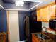 Clean kitchen with stainless steel appliances, granite countertops, and modern lighting at 1935 Conway Rd # M1, Orlando, FL 32812