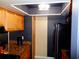 Kitchen featuring wood cabinets, granite countertops and modern appliances at 1935 Conway Rd # M1, Orlando, FL 32812