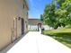Expansive backyard patio featuring a built-in grill and space for outdoor entertaining at 238 Hunt St, Clermont, FL 34711