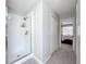 Bright bathroom featuring a walk-in shower with white subway tile surround at 238 Hunt St, Clermont, FL 34711