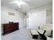 Third view of the Bedroom shows closet, dresser, and a glider with ottoman at 238 Hunt St, Clermont, FL 34711
