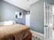 Bright bedroom with neutral decor and closet space at 238 Hunt St, Clermont, FL 34711