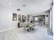 Open-concept living features a dining area, kitchen, and stylish decor, creating a welcoming atmosphere at 238 Hunt St, Clermont, FL 34711