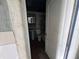 Bathroom with white fixtures, including a pedestal sink and tiled shower/tub, needing TLC at 269 12Th Ave, Ocoee, FL 34761