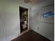 View from bedroom of the updated bathroom with a modern toilet and a vanity with storage at 269 12Th Ave, Ocoee, FL 34761