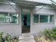 Charming front entrance to this brick home featuring a covered entryway and newer windows at 269 12Th Ave, Ocoee, FL 34761