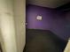 View of room with purple wall, black floor, needing TLC at 269 12Th Ave, Ocoee, FL 34761