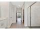 A bathroom hallway leads to the shower and vanity at 109 Violet Ct, Kissimmee, FL 34759