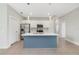 Modern kitchen with stainless steel appliances and central island at 109 Violet Ct, Kissimmee, FL 34759