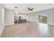 Open living area with modern finishes, blending into the kitchen at 109 Violet Ct, Kissimmee, FL 34759