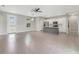 Spacious open-concept living area with modern ceiling fan and lots of natural light at 109 Violet Ct, Kissimmee, FL 34759
