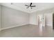 Large main bedroom with ample space, tile floors, and access to bathroom at 109 Violet Ct, Kissimmee, FL 34759
