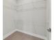 A simple walk-in closet features basic wire shelving at 109 Violet Ct, Kissimmee, FL 34759