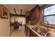 Updated kitchen featuring stainless steel appliances, tile backsplash, and wooden cabinets at 209 Fairway Dr # 209, Longwood, FL 32779