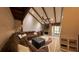 Spacious living room with vaulted ceilings, wooden beams, and a large sectional sofa, creating a cozy atmosphere at 209 Fairway Dr # 209, Longwood, FL 32779