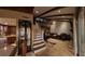 Spacious open-concept living space with exposed beams, seamlessly connecting the dining area, kitchen, and Gathering room at 209 Fairway Dr # 209, Longwood, FL 32779
