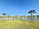 Beautiful view of the community with scenic water views, colorful buildings, and lush greenery at 3117 Caribbean Soul Dr, Kissimmee, FL 34747
