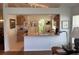 Open-concept kitchen overlooking the living area, perfect for entertaining guests at 4012 Capland Ave, Clermont, FL 34711