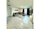A spacious living room featuring tile floors and ample natural light at 577 Talisi Loop, St Cloud, FL 34771
