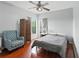 Bedroom featuring natural light, hardwood floors, and seating at 6839 Hidden Glade Pl, Sanford, FL 32771